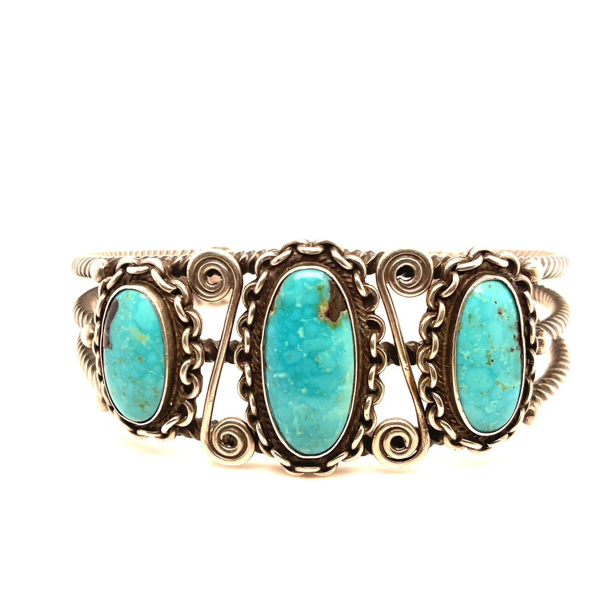 1920s Ingot 3 Stone Turquoise Bracelet  Dimensions: Opennings 1.1 inches and circumference 2.5 inches  NOTE: Please bear that in mind that, when you purchase vintage, it might not be perfect, but it will be authentic. Please contact shop@sbvail.com if you have additional questions about the nature and condition of the product.