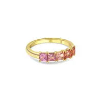 A kaleidoscope of rare colored, natural sapphires reminds us of a blazing pink distant sunset sky.  Set in 18k gold, this one-of-a-kind ring features 1.42 carats of sapphires.  Whether worn by itself or stacked with other bands, this ring commands attention. Ring Size 6.5. If you need a different size, please email shop@sbvail.com