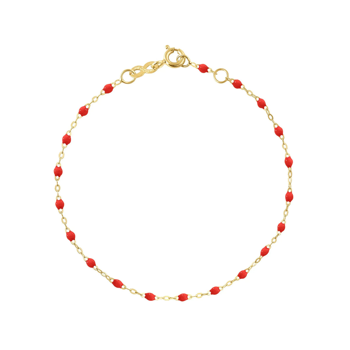 The Classic Gigi bracelet by gigi CLOZEAU features 18K Yellow Gold, and unique Poppy jewels for a simple, everyday look.   Each jewel is unique, artisanally made in their family-owned workshop. 18K yellow gold and resin. The bracelet measures 6.7 inches with adjustable clasp at 6.3 inches.