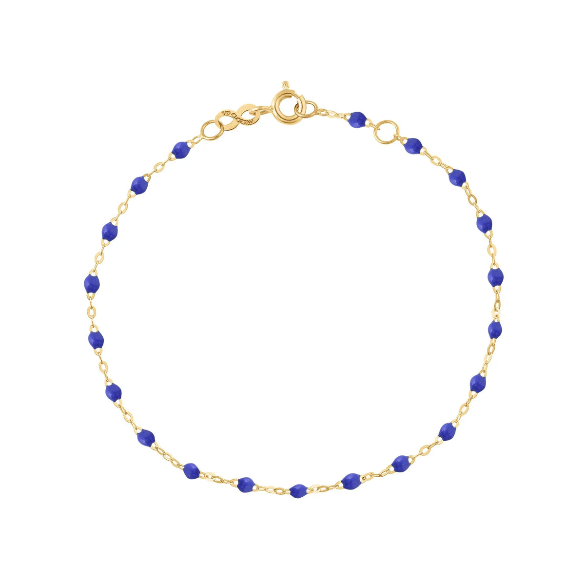 The Classic Gigi bracelet by gigi CLOZEAU features 18K Yellow Gold, and unique Bleuet jewels for a simple, everyday look.   Each jewel is unique, artisanally made in their family-owned workshop. 18K yellow gold and resin. The bracelet measures 6.7 inches with adjustable clasp at 6.3 inches.