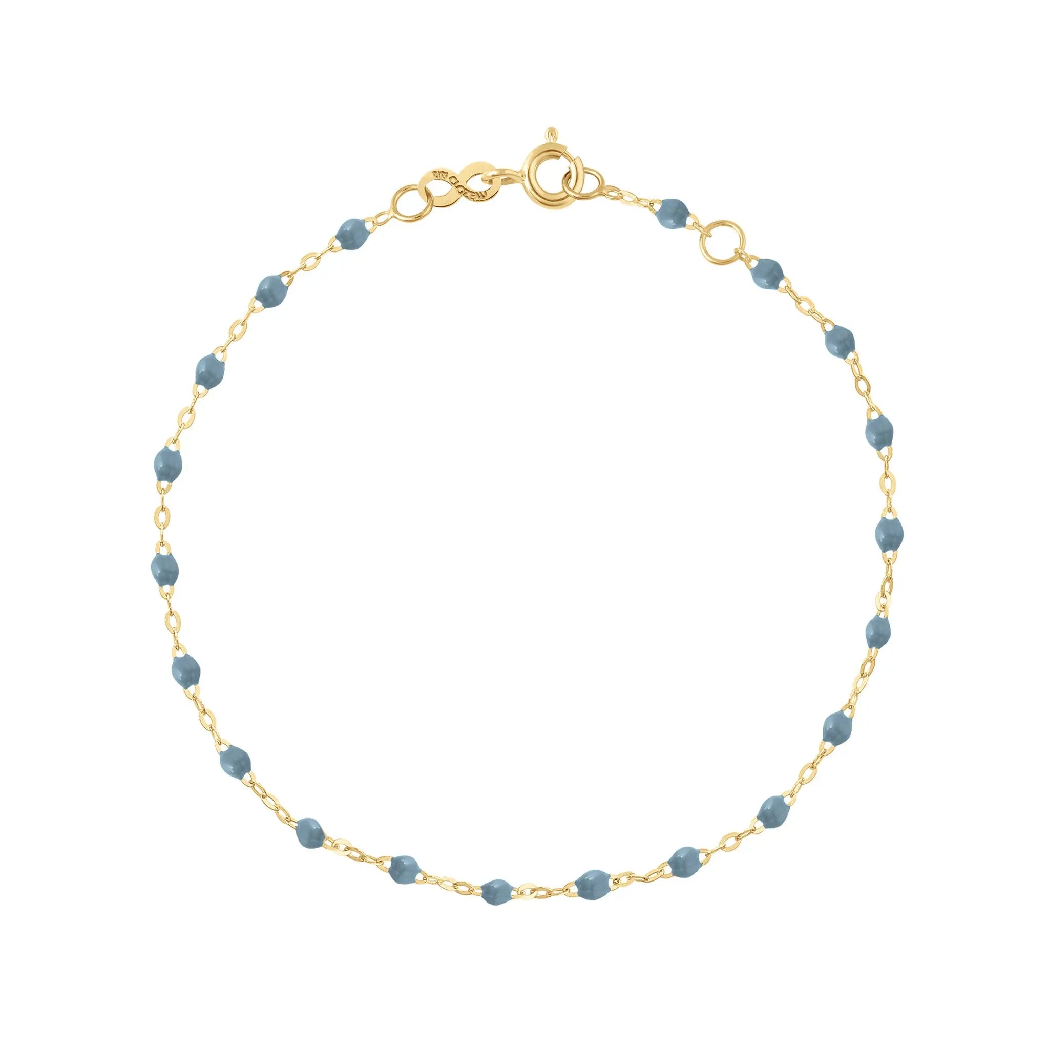 igi bracelet by gigi CLOZEAU features 18K Yellow Gold, and unique Jean jewels for a simple, everyday look.   Each jewel is unique, artisanally made in their family-owned workshop. 18K yellow gold and resin. The bracelet measures 6.7 inches with adjustable clasp at 6.3 inches.