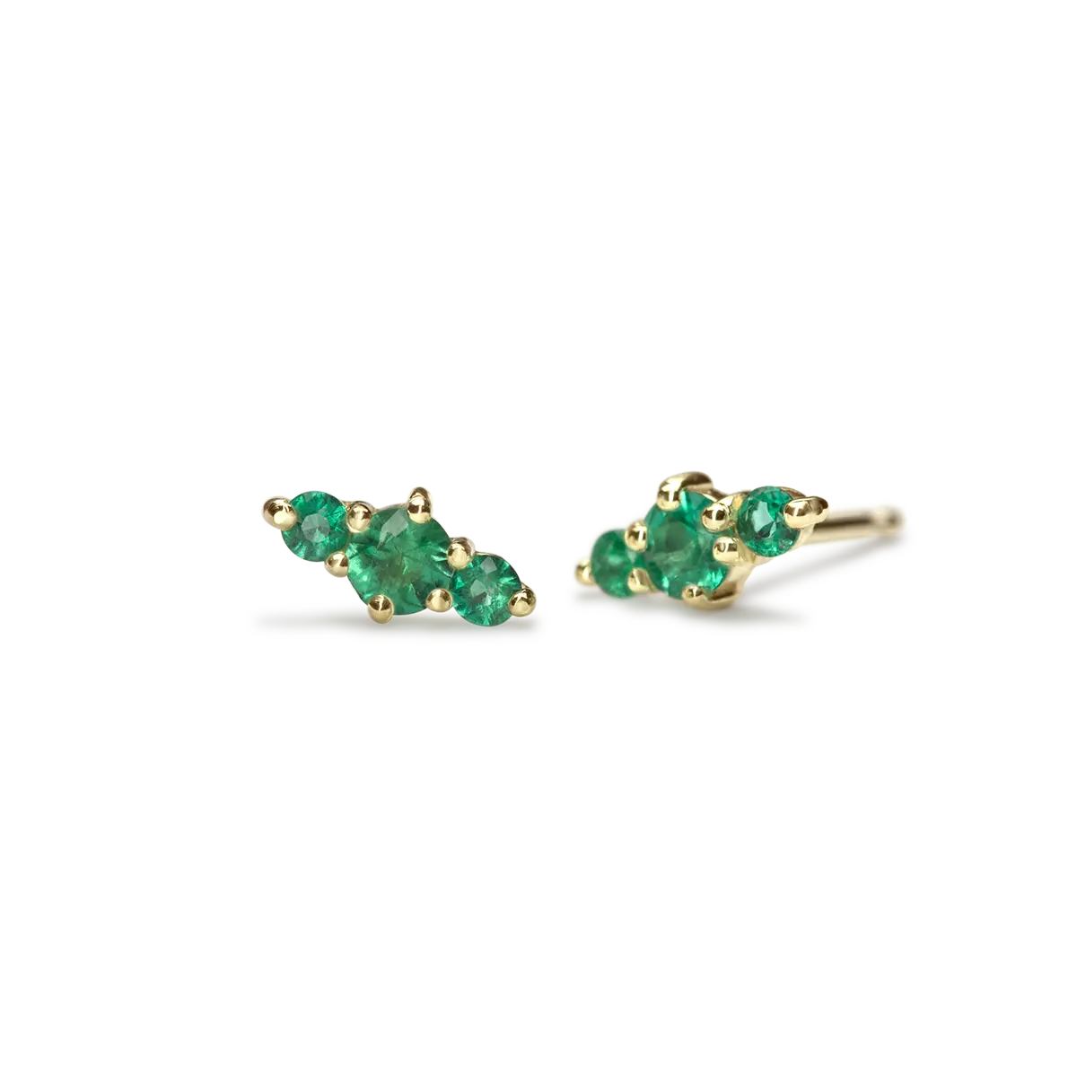 Three Emeralds that balance each other perfectly.  14K sustainable gold 0.25 tcw round emeralds  Dimensions: 3.5 x 7.3mm  Designed by Ila Collection