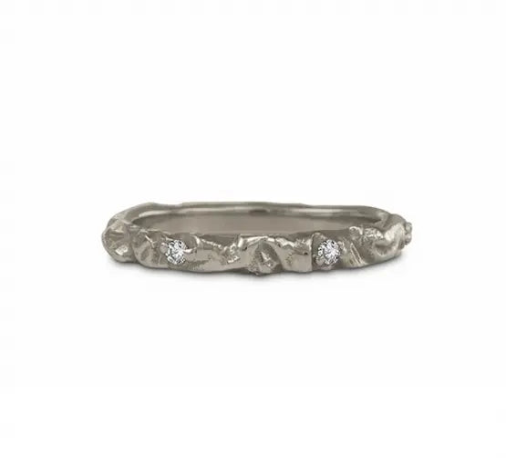 18k White Gold Band with .08 cttw diamonds inspired by Arches National Park.  Dimensions- 2.85mm wide
