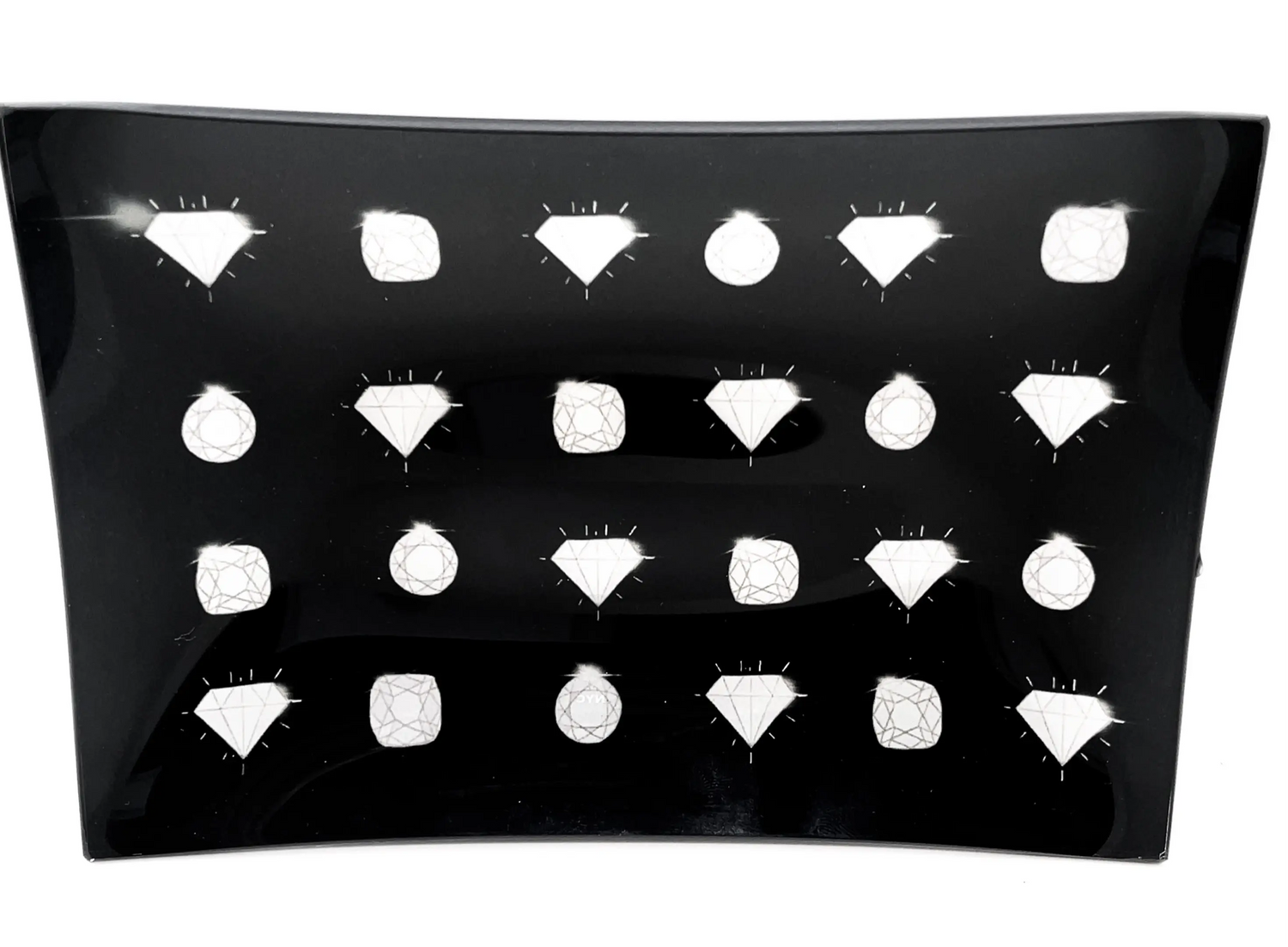 The dish that holds your jewelry should be just as fun as your jewels.   This glass handmade jewelry tray is great alone or paired with your favorite diamonds.   Made by Lisa Bayer and size 6X6 with black and white diamonds.
