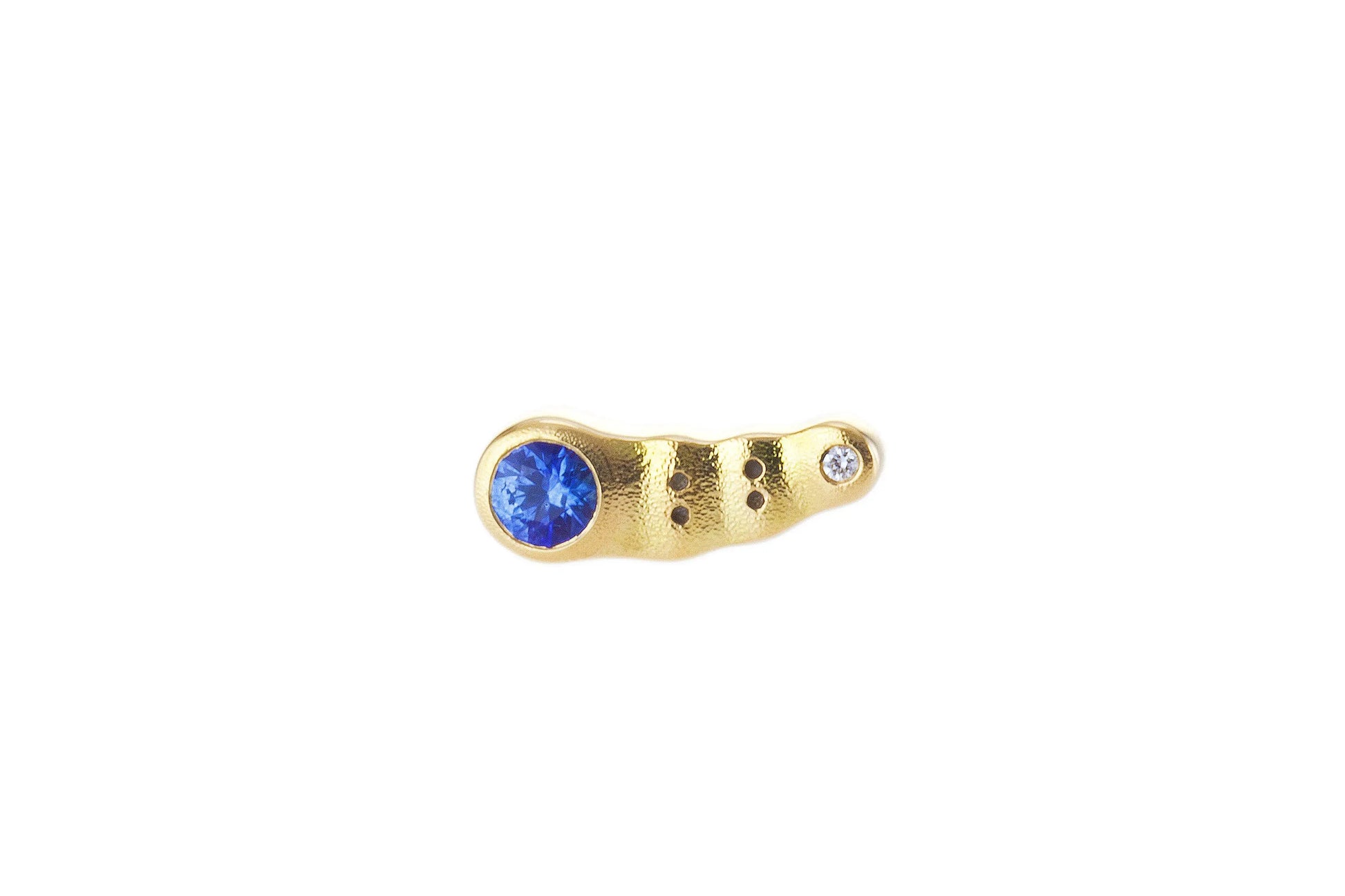 18k yellow gold sapphire and diamond "Flora" studs. Sold as a single  Details: 1 blue sapphire .13ct and 1 diamond .005ct  If you are interested in different stones, please email shop@sbvail.com.  If an item is out of stock, please allow 4-6 weeks for delivery.  Designed by Alex Sepkus