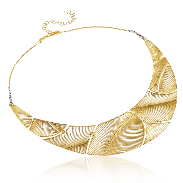 18k yellow gold and reversible clasp in 18k white gold with diamonds or 18k yellow gold.  Approximate diameter: 140 mm.  Diamonds: VS G/H.  If the item is out of stock, please allow 3-5 weeks for delivery. We have some pieces in stock. To check our availability please send an email to shop@sbvail.com.   Designed by Luisa Rosas and made in Portugal