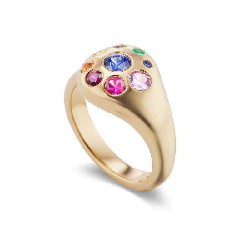Rainbow Medium Petal Ring with Sapphires and Emeralds set in 18k yellow gold. The ring is a size 6, if you need a different size please email shop@sbvail.com.  Designed by Brent Neale and made in New York